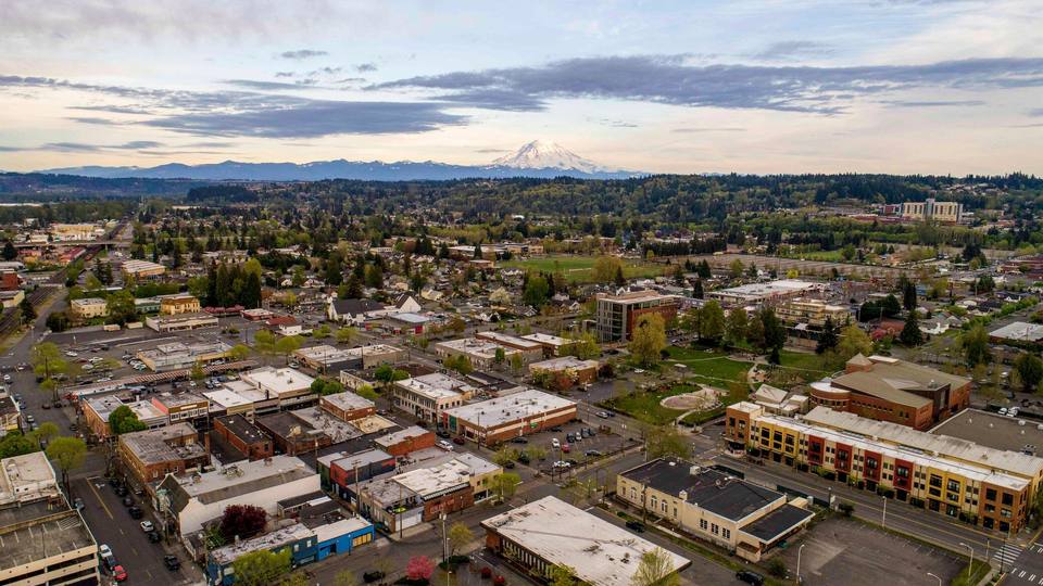Aerial view of downtown Puyallup with Mount Rainier in the distance